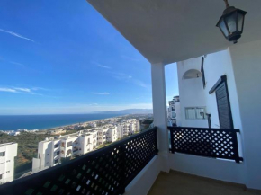 A furnished apartment on the sea with a pool
